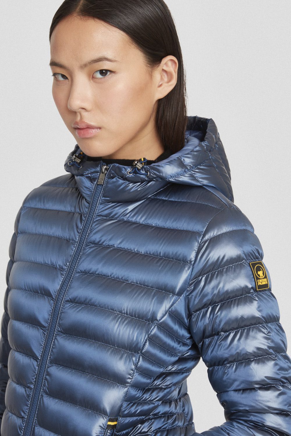 Piumino leggero azzurro con cappuccio AGHATA 2.0