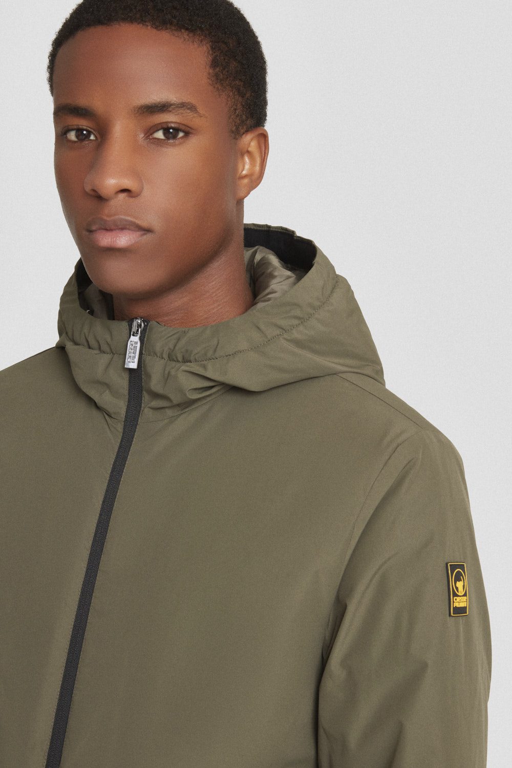 Giacca imbottita verde con cappuccio PETER