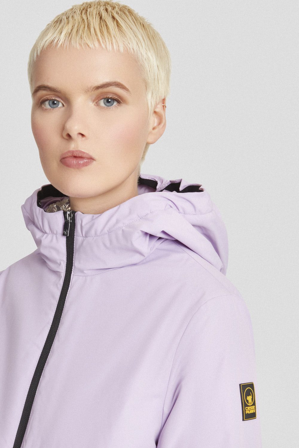 Giacca imbottita lilla con cappuccio