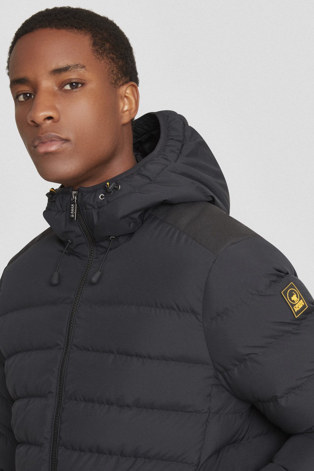 Piumino corto nero con cappuccio STEVENSON 3.0